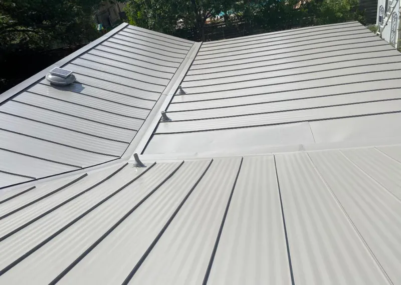 Solar attic fan installed on a metal roof for Roof Ventilation in German Flatts